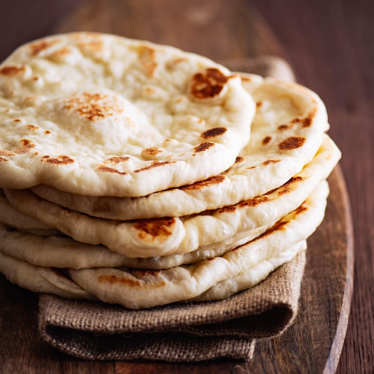 Fresh Naan Bread: A Must-Try at Our Restaurant